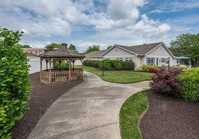 Gazebo in a landscaped outdoor space.