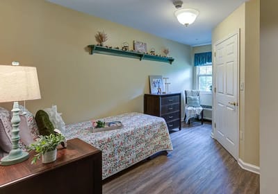 Cozy private resident room with a bed and decor