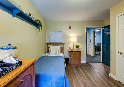 Cozy resident room with a bed and decorative elements