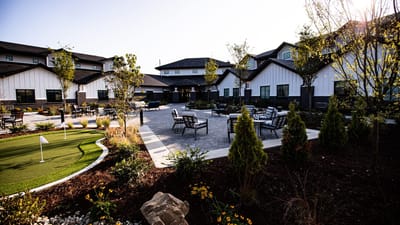 Outdoor courtyard with seating and greenery