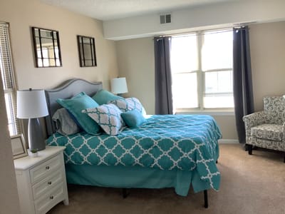 Cozy decorated bedroom with a blue theme