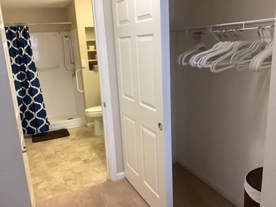 Interior view of a resident's bathroom and closet
