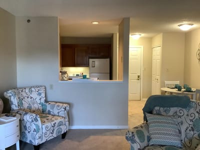 Bright interior living space with decorative chairs