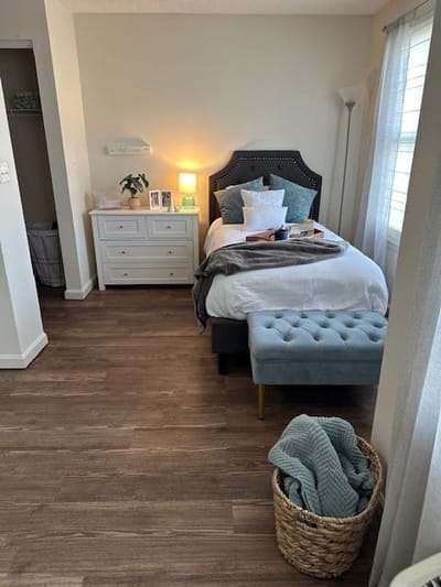 Cozy resident room with bed and personal decor