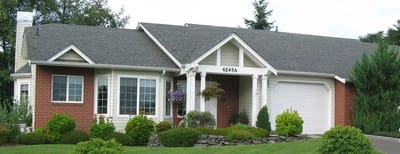 Exterior view of a residential building with landscaping