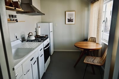 Cozy kitchen with dining table and chairs