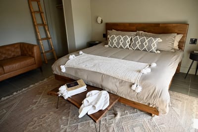 A well-furnished private bedroom with a cozy atmosphere