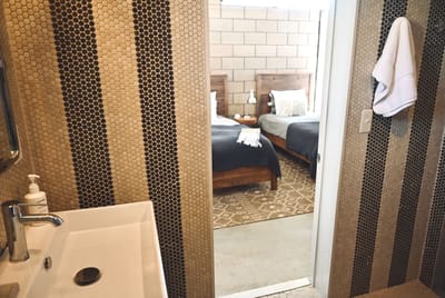 Interior view of a private resident room and bath