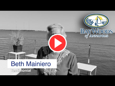 Logo of Baywoods of Annapolis with a resident testimonial