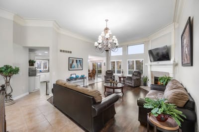 Interior common area with comfortable seating and chandelier