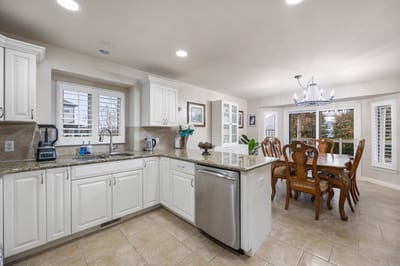 Bright kitchen and dining area in a senior living facility