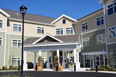 Exterior view of the Benchmark Senior Living facility entrance
