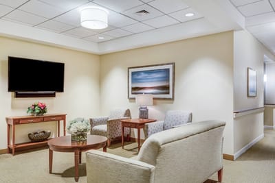 Cozy common area with seating and artwork