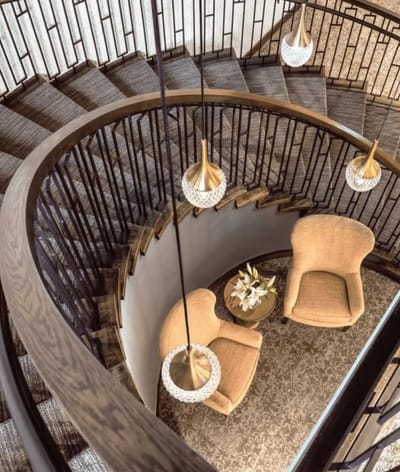 Stylish interior staircase with seating area