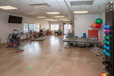 Interior view of a fitness area with equipment