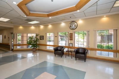 Common area with seating and large windows