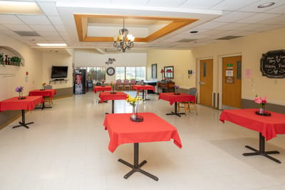 Interior common area with tables set for an event
