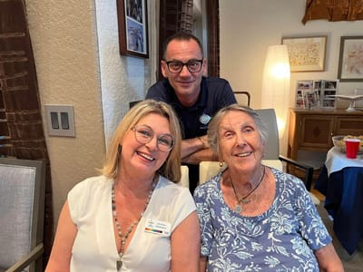 Residents smiling together in a common area
