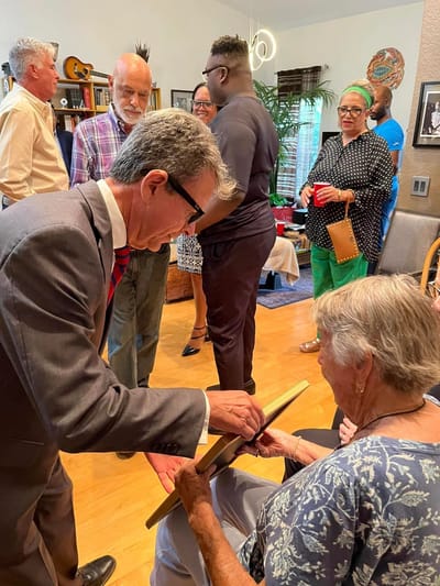 Residents participating in an indoor social event