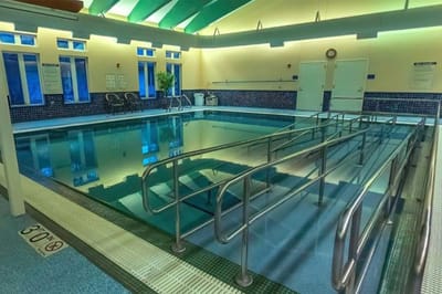 Indoor pool area with accessibility features