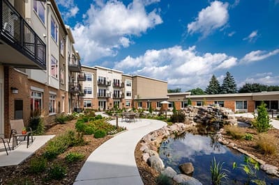 Beautiful outdoor courtyard with pond and gardens