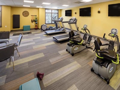 Fitness room with exercise equipment and space
