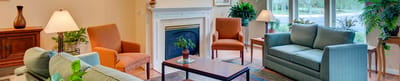 Bright and cozy interior common area with seating