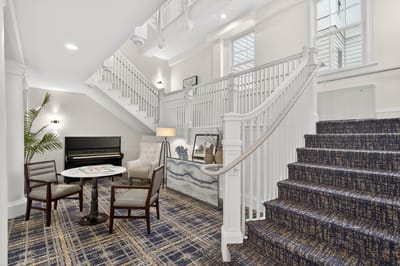 Bright and welcoming interior common area with seating