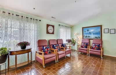 Bright common area with seating and artwork