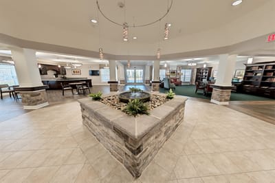 Interior lobby with a fountain and seating areas