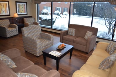 Comfortable common area with seating and natural light
