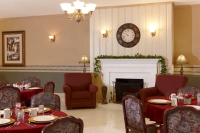 Dining area with tables set for meals and seating