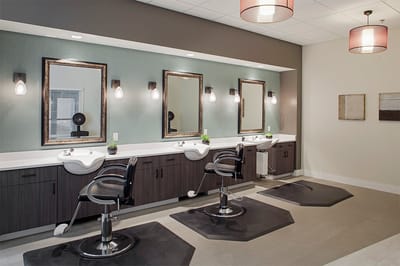 Salon area with chairs and mirrors