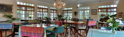 Bright dining area with colorful table settings