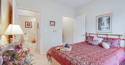 Cozy resident room with a bed and decor