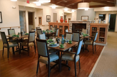 Dining room set up for a meal with green tableware