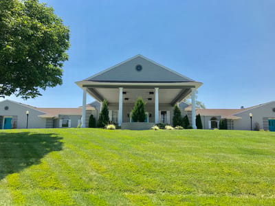Beautifully maintained exterior of a senior living facility