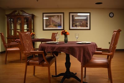 Cozy dining setup with flowers and table settings