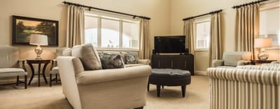 Cozy common area with comfortable seating and a TV