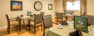 Dining room with tables set for a meal