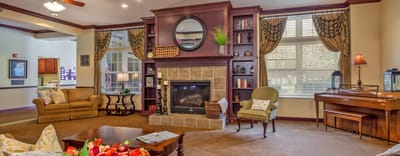 Cozy common area with seating and a fireplace