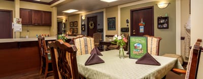 Cozy dining area with table settings and decor