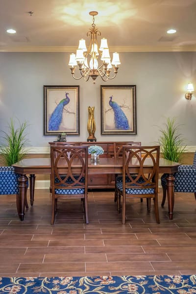 Interior common area with decorative chairs and artwork