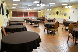Chadwick Community Care Center, nursing home in Jackson, MS — Dining area with tables and seating in a facility