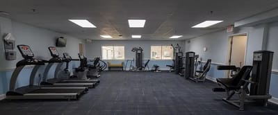 Well-equipped fitness area in a senior living facility