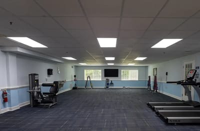 Interior view of a fitness room with exercise equipment