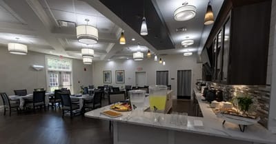 Bright dining room with refreshments and seating