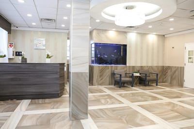 Interior view of a reception area with fish tank