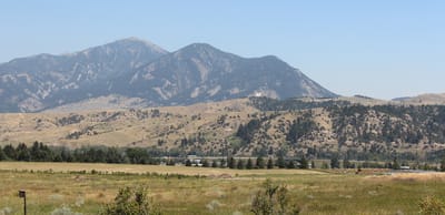 Scenic view of mountains and open fields