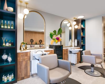Interior view of a salon area with styling chairs